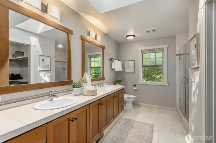 Primary bathroom with large walk in closet.