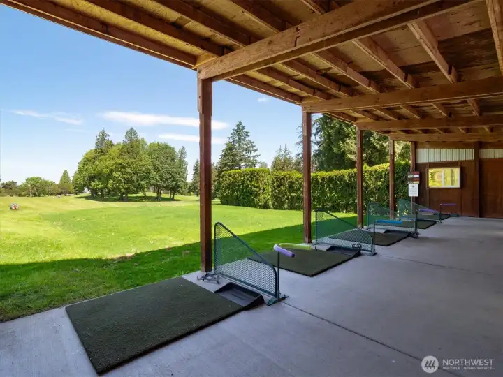 View of the indoor covered driving range.