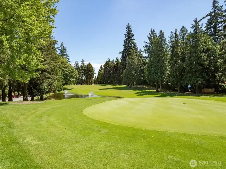 Picturesque view of the 18th green adjacent to the clubhouse.