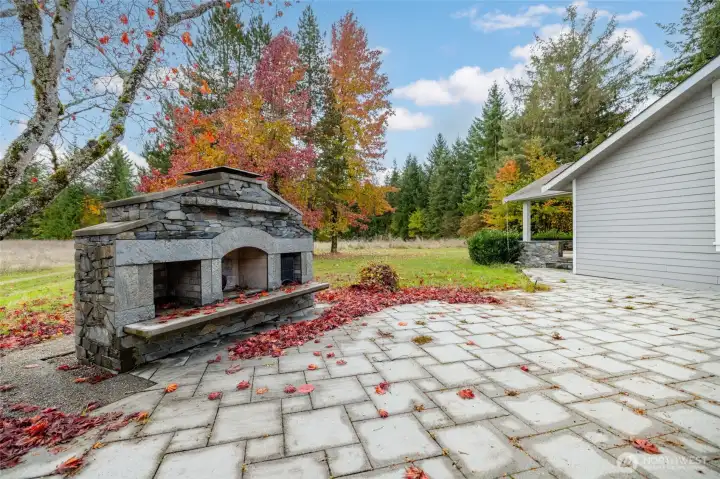 Terrace with outdoor fireplace
