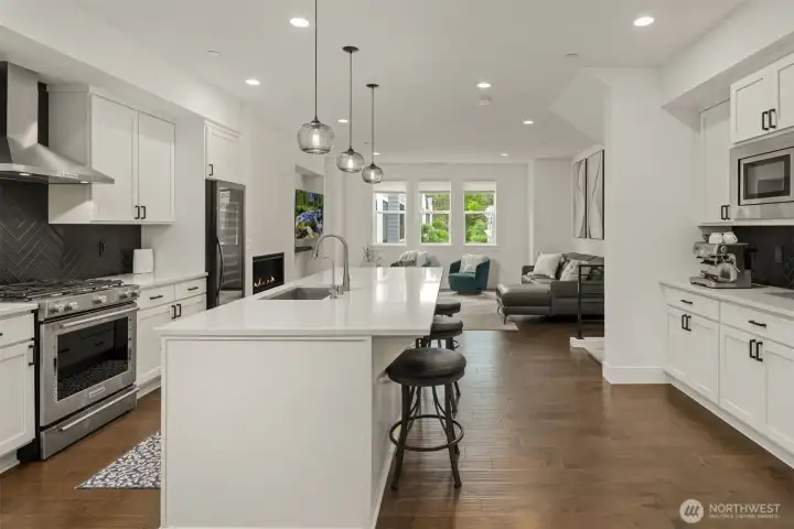 Flooded with natural light the chefs kitchen boats a custom coffee bar fit for our Pacific Northwest lifestyles. Flooded with natural light the chefs kitchen boats a custom coffee bar fit for our Pacific Northwest lifestyles.