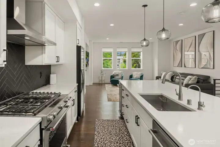 The light filled kitchen has easy access for prep with your upgraded appliance package. The entire floor serves as great room for all your gatherings. The light filled kitchen has easy access for prep with your upgraded appliance package. The entire floor serves as great room for all your gatherings.