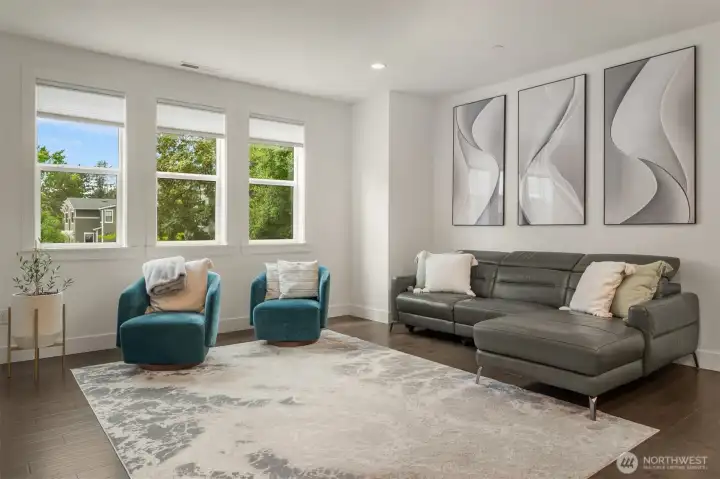 The large family area serves as a relaxing space at the end of the day. The large family area serves as a relaxing space at the end of the day.