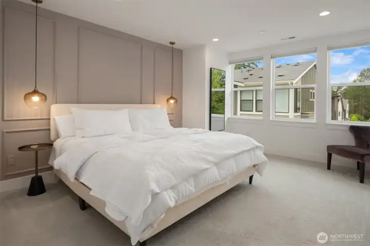 Massive Primary bedroom is fit for royalty. The Italian designer lighting and the designer wall features provide the perfect backdrop for the kingsize bed. Massive Primary bedroom is fit for royalty. The Italian designer lighting and the designer wall features provide the perfect backdrop for the kingsize bed.