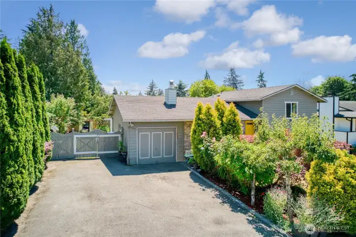 Driveway provides ample off-street parking.