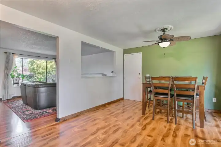 Sunlit dining space that flows right into the living room.