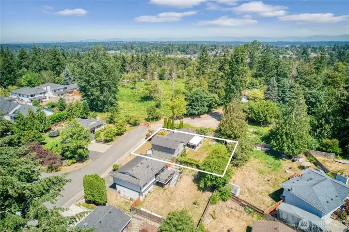 Property outlined, set on a quiet street.