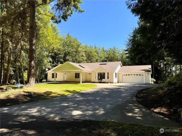 Plenty of parking with an attached 2 car garage and a big driveway.