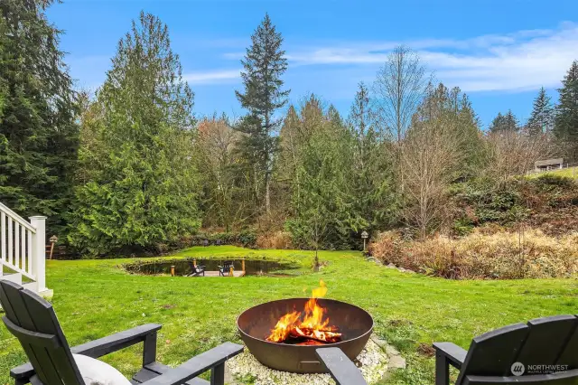 View from the Deck over the yard and natural pond & creek