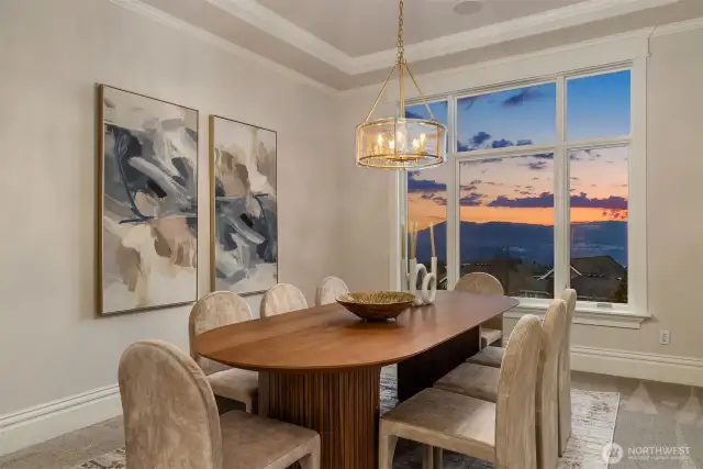 Main level dining room with built in cabinetry and those views.