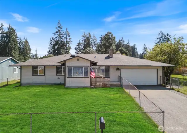 Photo has been edited. Front yard freshly renovated, and grass seed just planted.