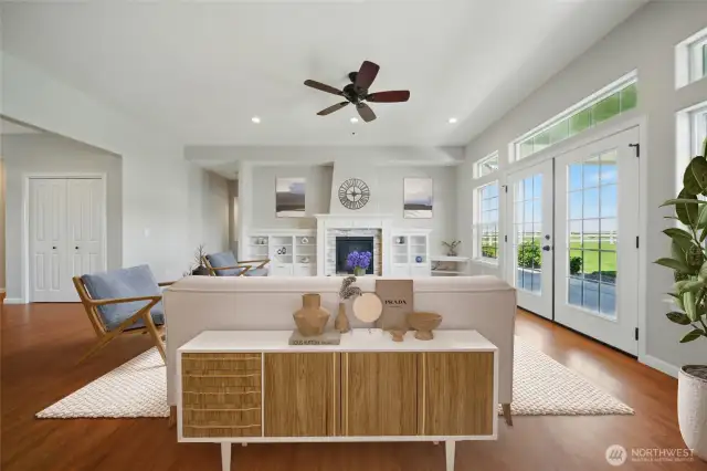 Living room with custom cabinetry. Virtually staged