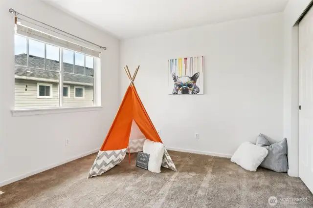 Over-sized guest bedroom with room for anything.