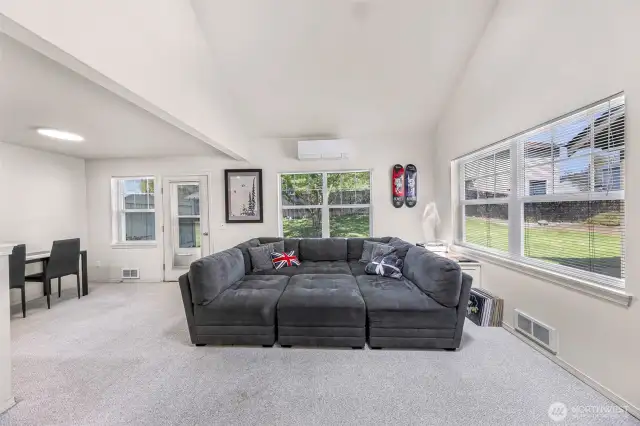 Natural light brought in through large windows