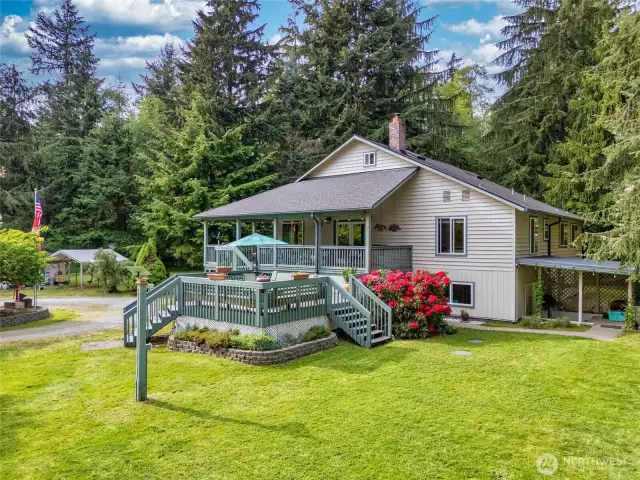 Private 3 bedroom home on shy 5 acres. Notice the covered outside entrance to the lower level on the right.