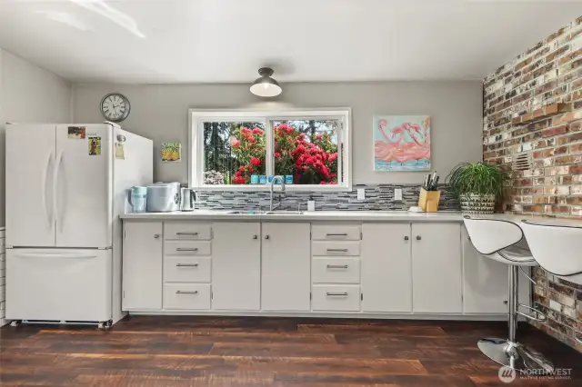 Bright & roomy lower level kitchen.
