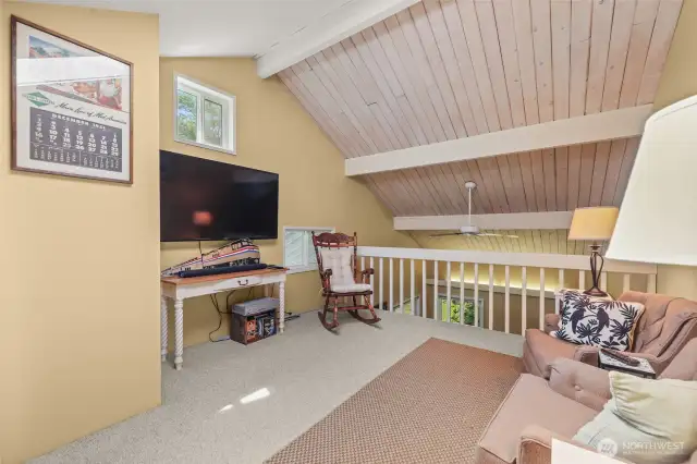 2nd floor loft area. Could be tv room, office area, or cozy nook for curling up with a good book!