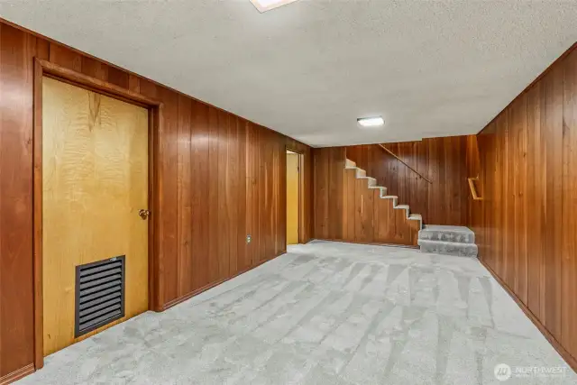 Door to workshop area and laundry room in the basement