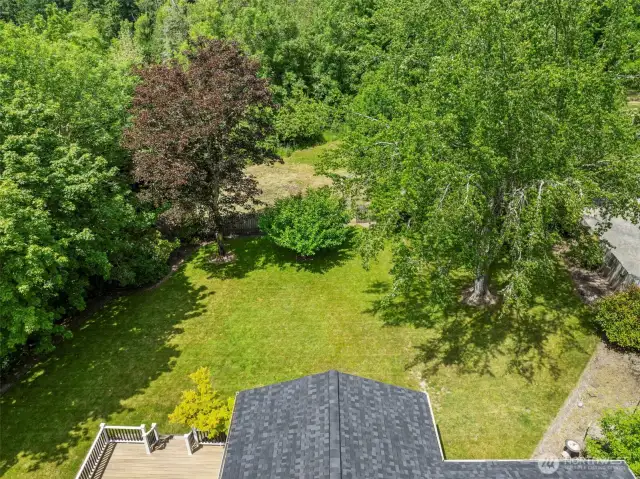 Fully fenced backyard with fully fenced garden space.