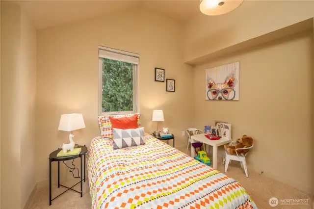 Vaulted ceilings and windows.