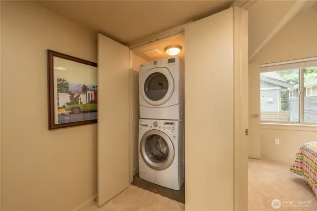 Large washer/dryer combo in a closet on the upper floor right next to the bedrooms. A light and whole house fan in there as well.