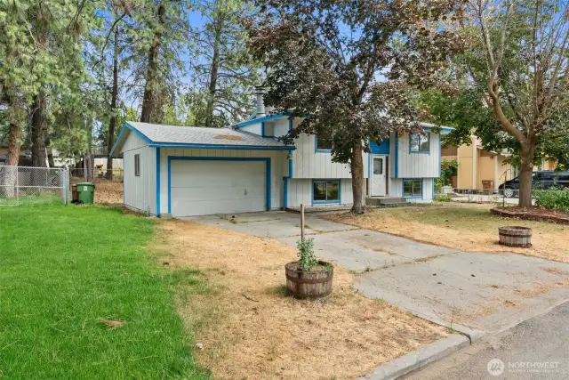 Discover the potential in this well-located 4-bedroom, 2-bath home in North Spokane.