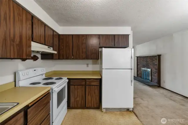 Stay part of the conversation with views from the kitchen into the living room.
