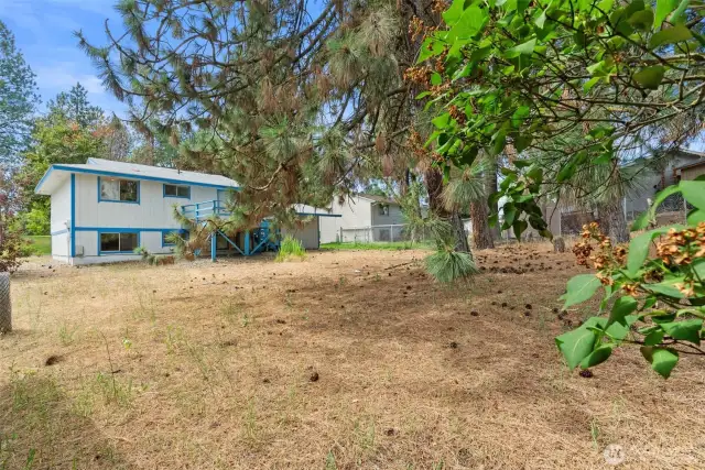 Ample outdoor space provides room for RV or extra vehicles.