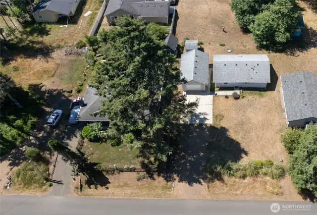 Deep, one car garage has a workshop in the back portion.  Great for woodworking, mechanic, or whatever trade you enjoy working!