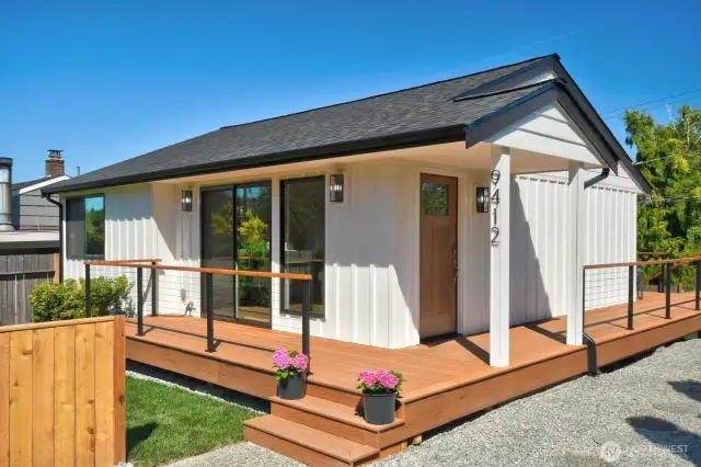 This turnkey property features new windows, roof, high-end flooring, a remodeled kitchen with luxury appliances, updated bathrooms and air conditioning.