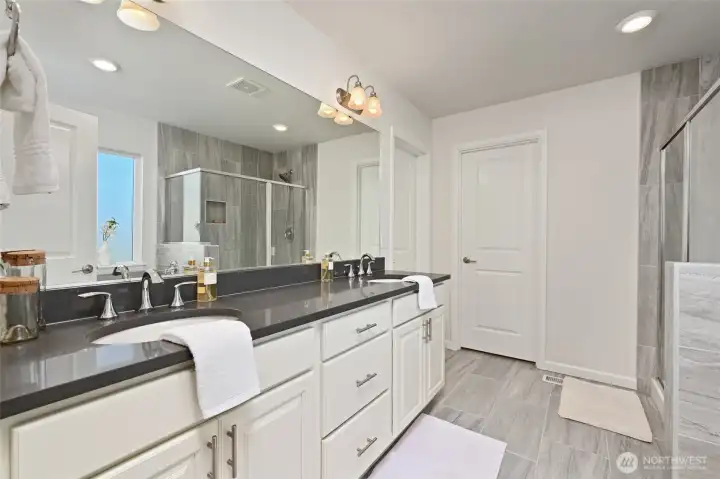 Primary bath has dual sinks.