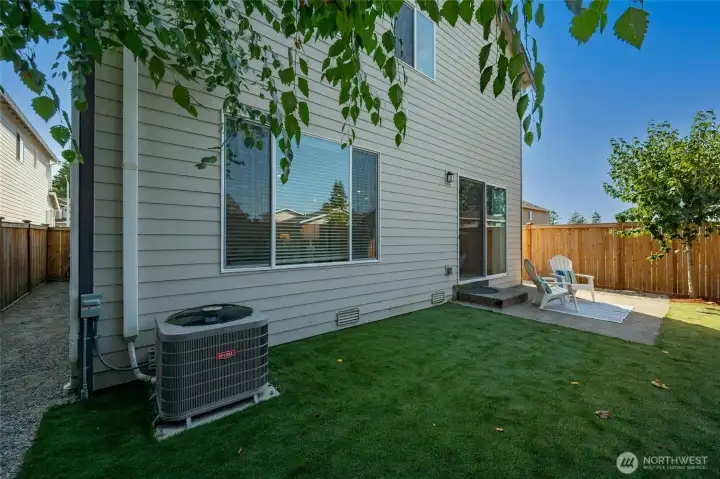 The home has A/C and a low-maintenance turf lawn.
