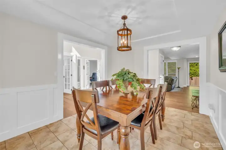 Elegant formal dining room with tray ceiling