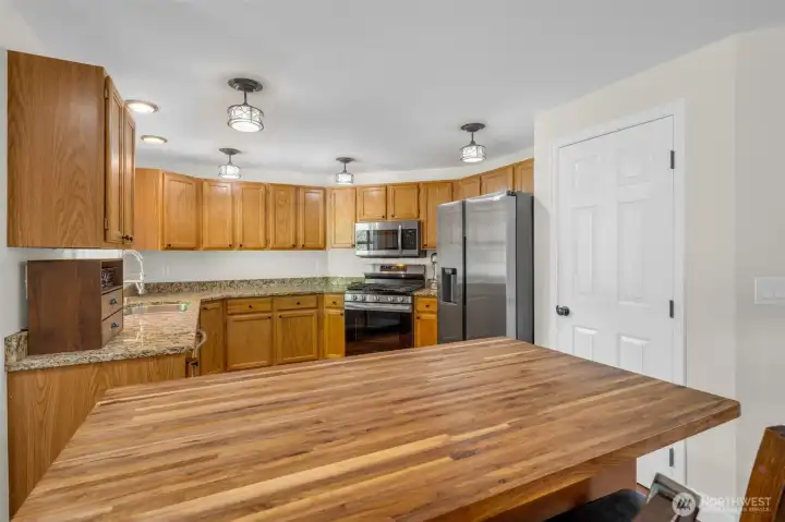 Open kitchen. Center island with breakfast bar.