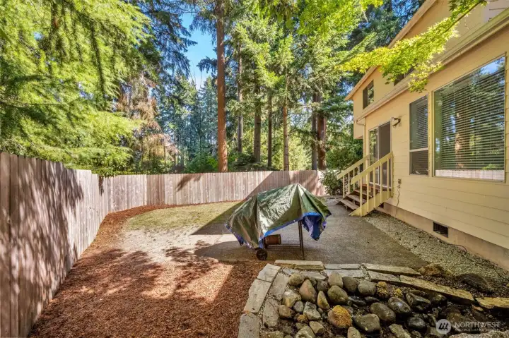 Fully fenced backyard. The property goes beyond the fence.