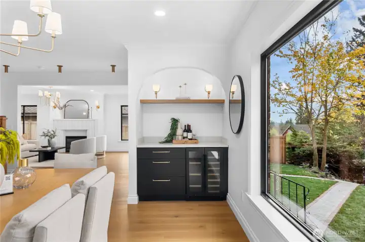 Beautifully crafted beverage and storage nook making entertaining a breeze!