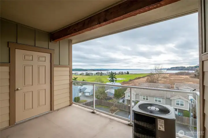Back porch with amazing view! Door to storage room.