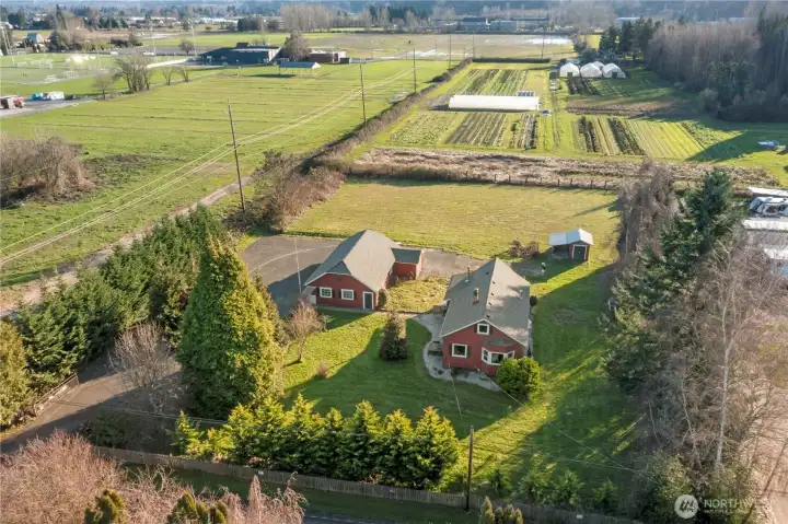 What a great way to see the property in context, showing its close connection to surrounding farmland and open agricultural space. The setting feels open and rural, with long sightlines across fields that reinforce privacy, light, and the peaceful character of the area.