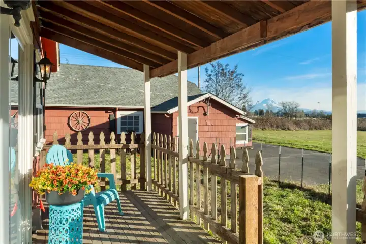 From the porch, the view opens across the property and out toward Mount Rainier, adding a sense of place that’s both calming and memorable. The outlook reinforces the home’s privacy buffer and connection to the surrounding land, while the mountain view provides a natural focal point that changes with the seasons. It’s a feature buyers don’t forget and one that adds daily enjoyment rather than occasional novelty. Rare to find unbostructed views on property this size in town.