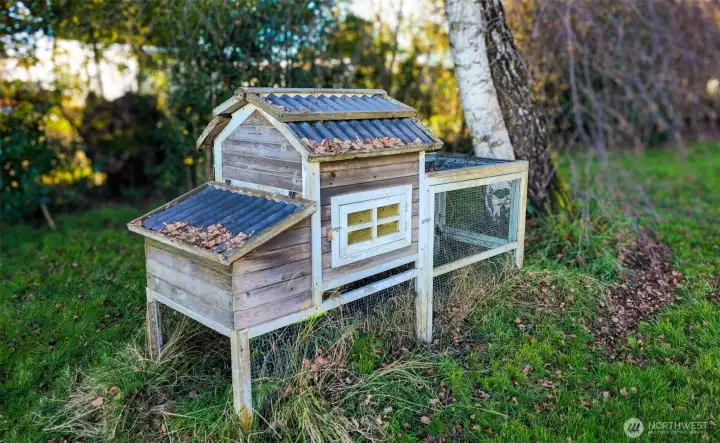 An existing chicken coop offers a head start for buyers looking to embrace hobby farming or fresh eggs at home. The surrounding flat land and rich soil make it easy to imagine gardens, animals, or future outdoor projects.