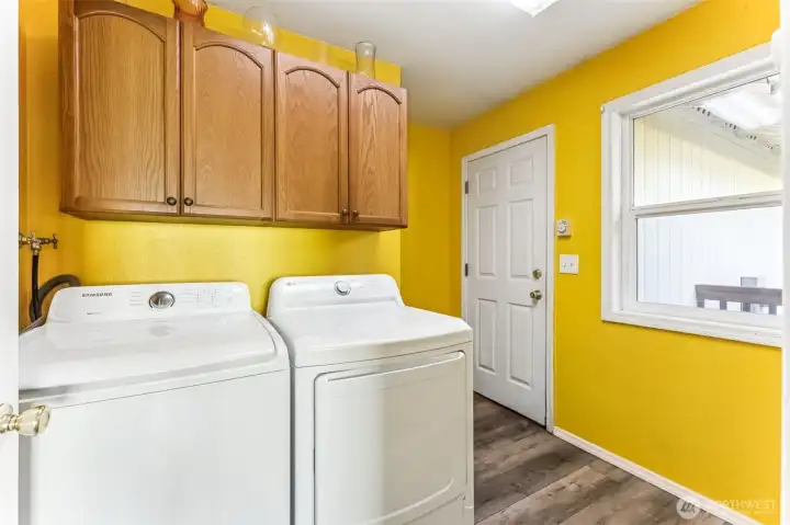 Laundry Room Leading to Attached Two-Car Garage