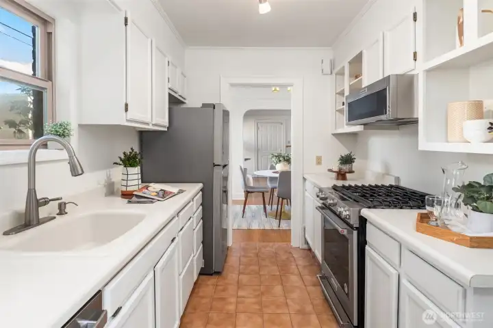 All appliances stay (range is gas)