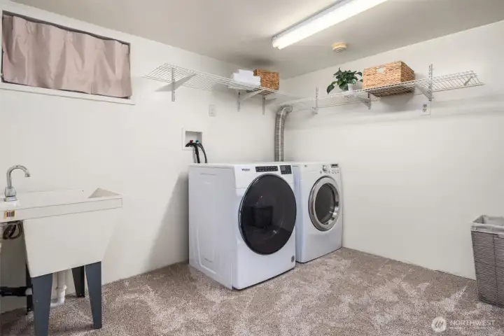 Laundry room & storage in  fully finished basement (all appliances stay)