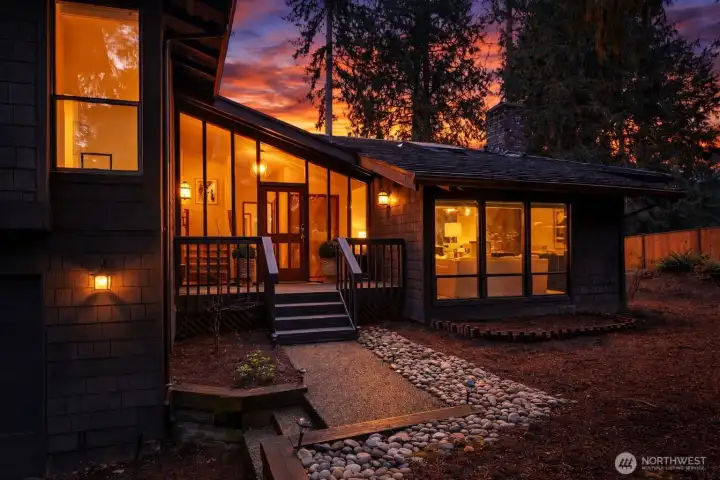 Welcoming entry that sets the tone for the home’s timeless mid-century character and warm natural materials.
