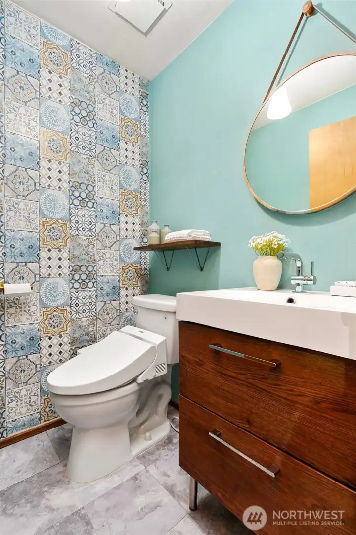 Vibrant updated Powder room on Main Level.