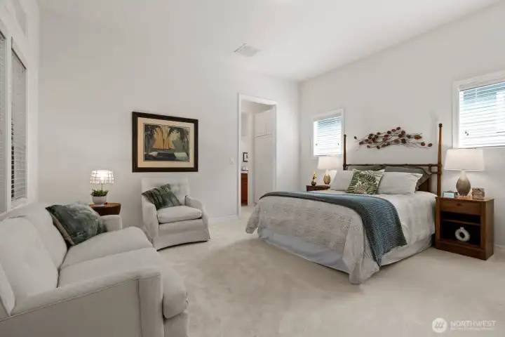 Secondary en-suite provides space for a queen or king-sized bed plus sitting area, and offers a full bath.