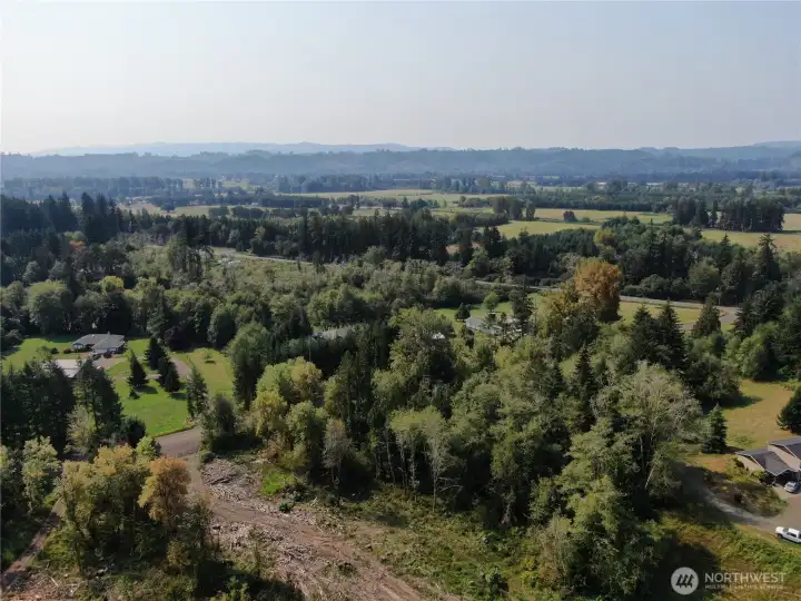 Aerial view looking SW. This view shows the entry to the property off Cedar Creek Rd and Hwy 12.