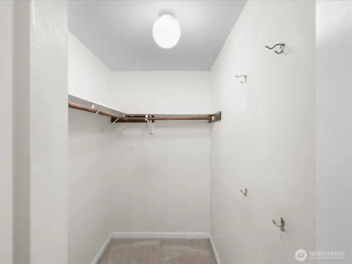 The primary suite walk-in closet.