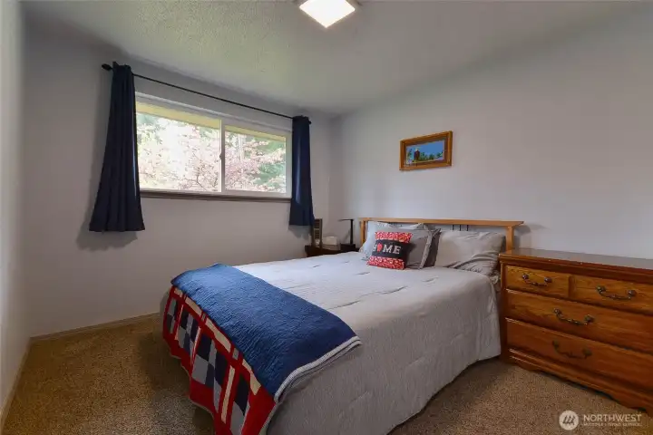 spacious 2nd bedroom with closets organizers.