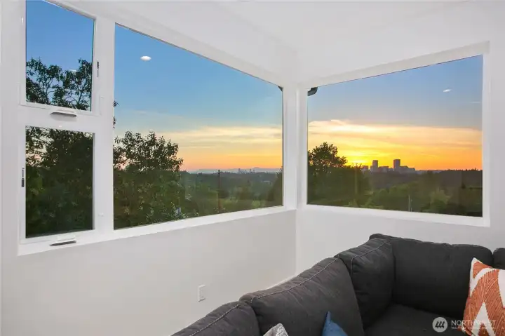 Expansive west corner windows frame stunning panoramic views